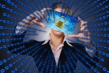 woman_holding_photo_of_lock_on_computer_screen